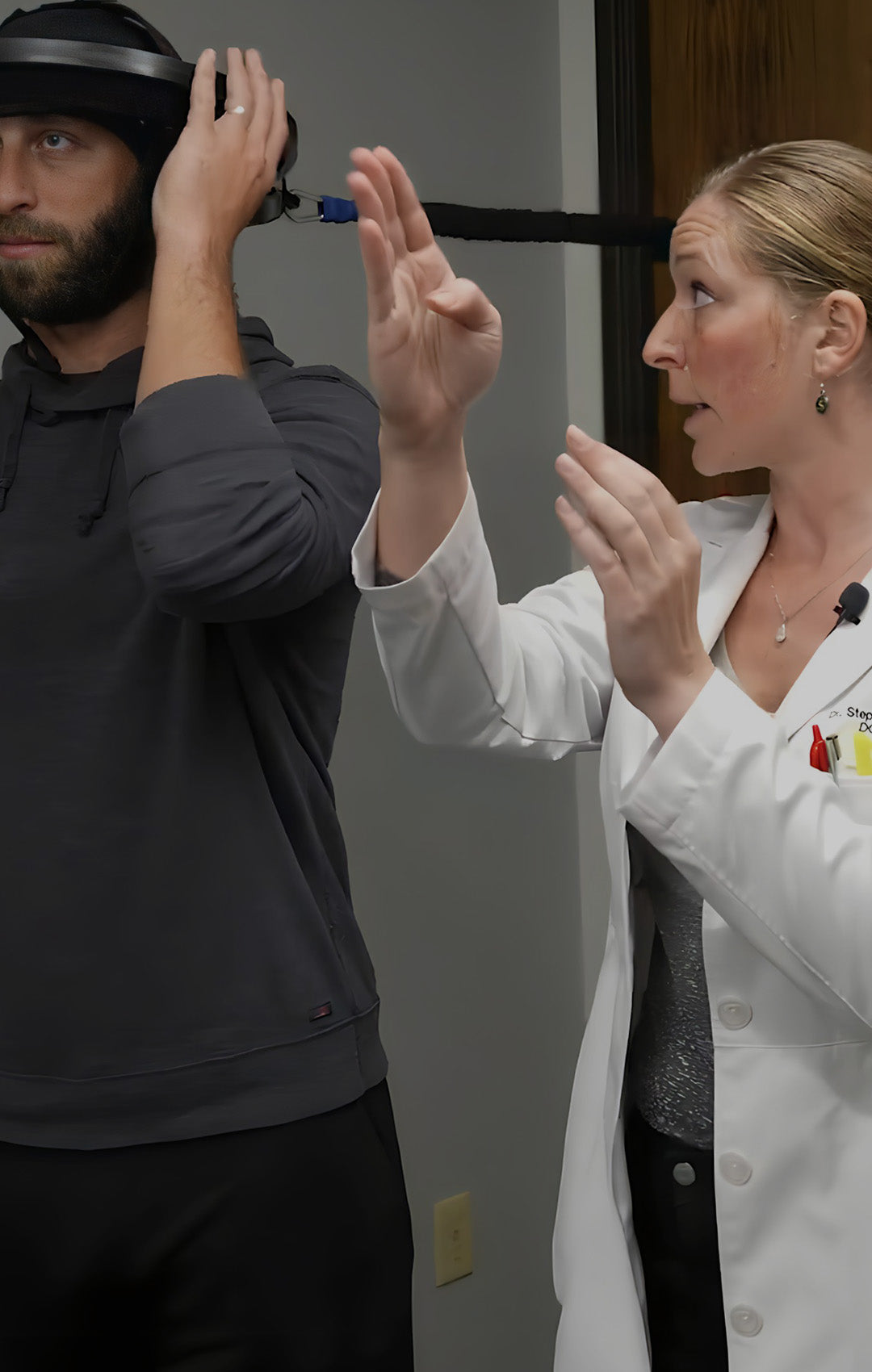 Stephanie Barbakoff using Iron Neck with patient